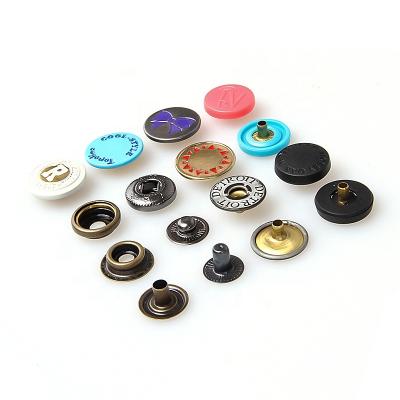 China Custom Engraved Dry Cleaning Logo Metal Round Spring Snap Button for sale