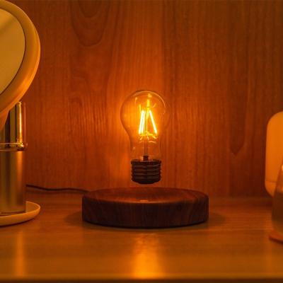 China Nordic Creative Minimalist Power Inductive Charger Radio Bedside Magnetic Levitation Bulb Room Touch Control Floating Lamp for sale