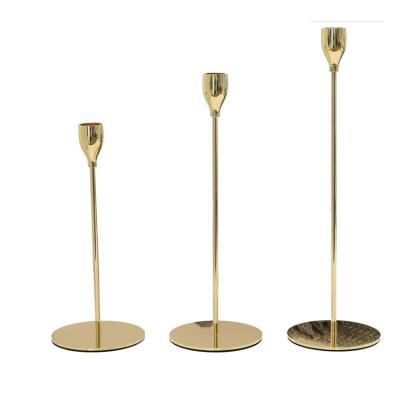 China New Luxury Unique Type Customized Metal Stocked Pillar Metal House Candle Holders Gold for sale