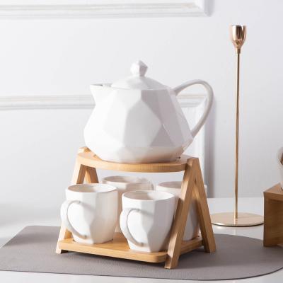 China Viable Nordic Diamond Shape Bamboo Stand Ceramic Tea Cup Set for sale