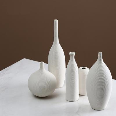 China New Minimalists Arrive Matte White Tall Flower Vase Modern Indoor Garden Ceramic Vase for sale