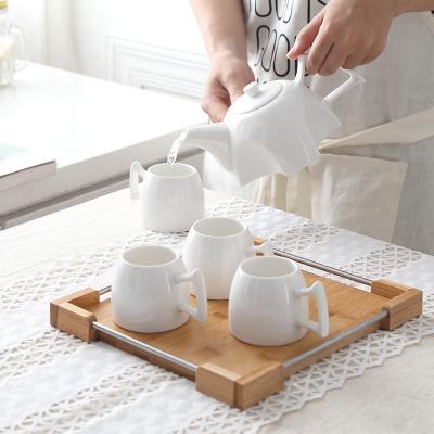 China Viable Irregular Plain China White Ceramic Tea Cup Set for sale