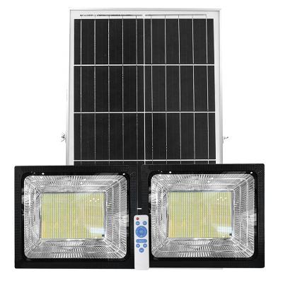 China High Brightness Ip65 Two Lights With One Solar Panel Outdoor Waterproof Solar Led Spotlight for sale