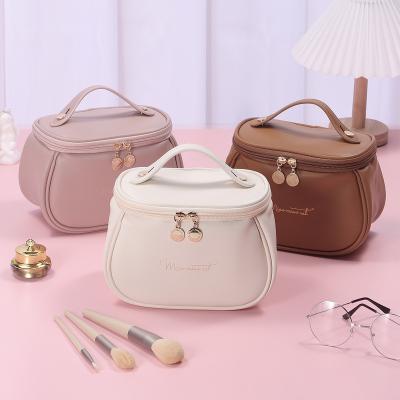 China Fashion Ladies Waterproof Large Capacity Pu Leather Cosmetic Bag Itembeauty Custom Portable Makeup Box Tray Cosmetic Makeup Storage Bags for sale