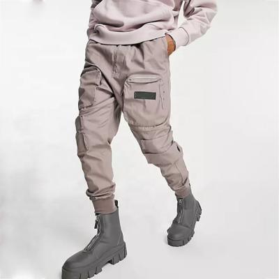 China OEM QUICK DRY Outdoor Rise Pants Stacked Joggers Pants With Side Pockets Cargo Pants Men for sale