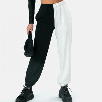 China Wholesale Custom Breathable Pants Two Tone Black White Half 2 Color Sweatpants Unisex Half 350 Gsm Tapered Basics Sweatpants Women for sale