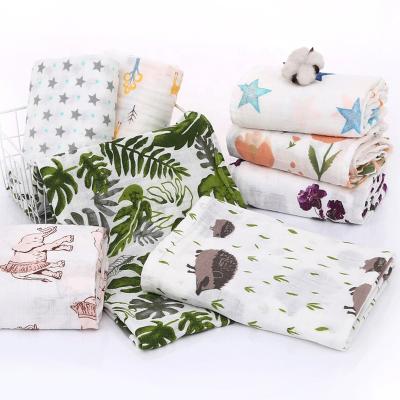 China PORTABLE Printed Organic Muslin Fabric 100% Gauze Cotton Super Soft Baby Shower Gift Muslin Wraps Newborn Blanket for sale