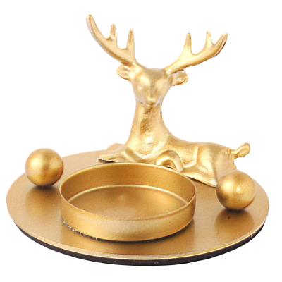 China Fashionable Christmas Decoration Reindeer Candle Holder Gold Moose Tealight Metal Candle Holder for sale