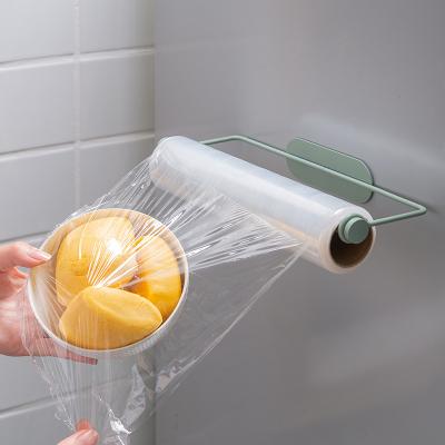 China Bathroom Kitchen Paper Towel Iron Rack Film Cool Shelf No Hanging Hole People Lazy Rags Roll Paper Rolling Shelf for sale