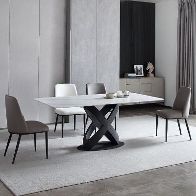 China Creative rectangular dining table and chair c dining table Italian minimalist foldable slate dining table and chair combination household for sale