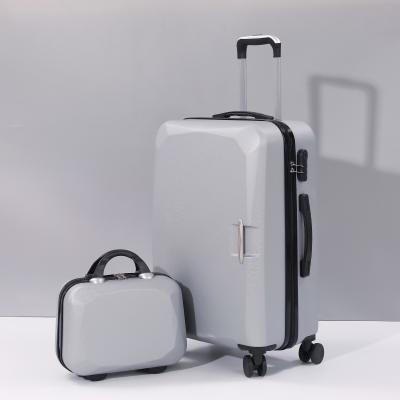 China Shell Trolley Luggage Geometric Travel Hard Luggage Suitcase Expandable Spinner with Wheels and Built-in TSA Lock for sale