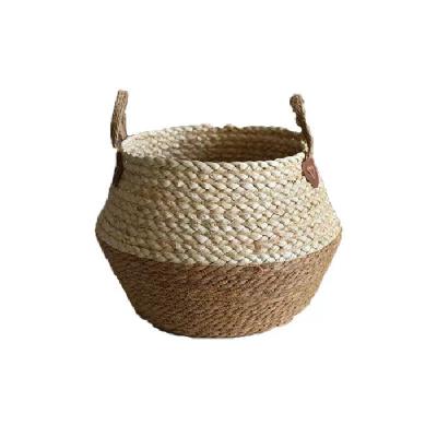 China Corrosion Resistance Straw Indoor Flower Pot With Handle Plant Flower Basket Garden Decoration Storage Basket for sale