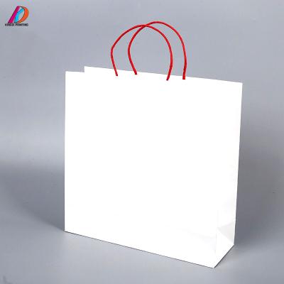 China Factory Supply BIODEGRADABLE White Kraft Paper Bag With Twisted Handle for sale