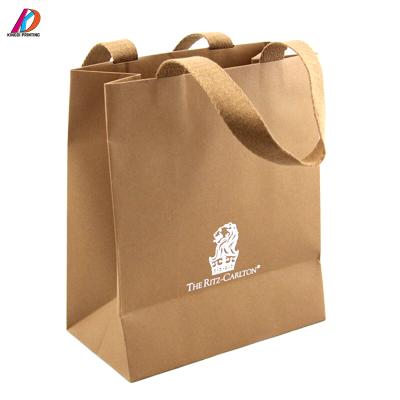 China Recyclable Wholesale Custom Logo Rigid Brown Kraft Paper Bag With Cotton Handle for sale