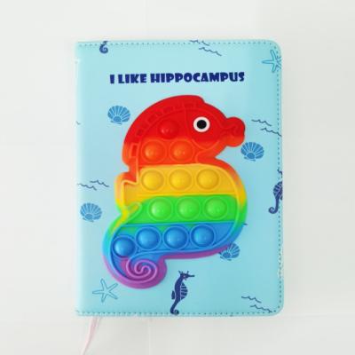 China Custom Cute Toy Reliever Stress Rainbow Push Bubble Bumpy Hardcover Book Seahorse Puzzle Game Cute Notebook for sale