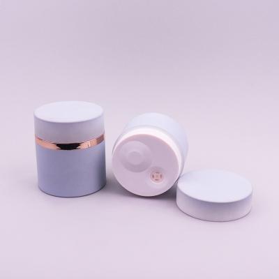 China Jarrones cosméticos sin aire con recubrimiento de caucho 30g 50g Contenedor de crema facial con tapa de tornillo en venta