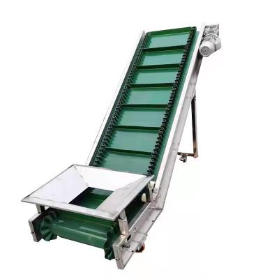 China Heavy Duty Belt Conveyor Bulkhead Lift Oil Bottle Carrier Belt Silo Feeding Belt Elevator for sale