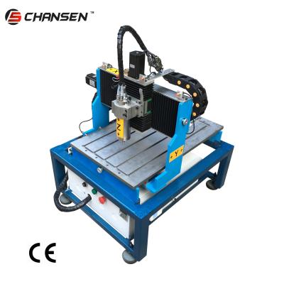 China Home use 800w water cooling 4060 benchtop 3 axis cnc router machine for wood engraving Te koop