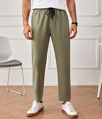 China Breathable Men Drawstring Waist Casual Pants Knit Tapered/Carrot Long Pants for sale