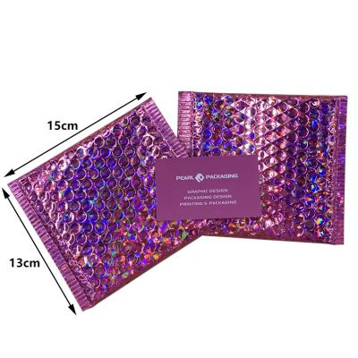 China New Cosmetics Stock Hot Pink Holographic Padded Bubble Mailer Size 15x13cm MOQ 600pcs for sale