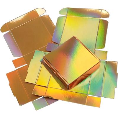 China Recyclable Holographic Metallic Shiny Gold Iridescent Golden Gift Box Cosmetics Packaging Box for sale