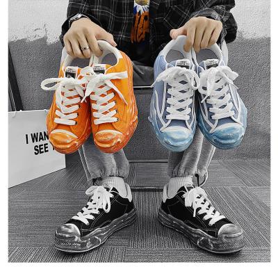 China 2022 Retro Men's Flat Shoes CUSHIONING Color Polished Canvas Casual Sneakers Sports Slow Tide Walking Shoes for sale