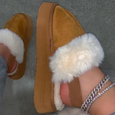 China CUSHIONING 2021 Winter Cotton Slippers Women's Warm Household Cotton Slippers Plus Size Plush Solid Color Half-Pack Cotton Slippers for sale