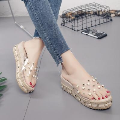 China Anti-odor pearl word slippers female summer style Han version fashion crystal outdoor outdoor one new use elegant transparent platform SA for sale