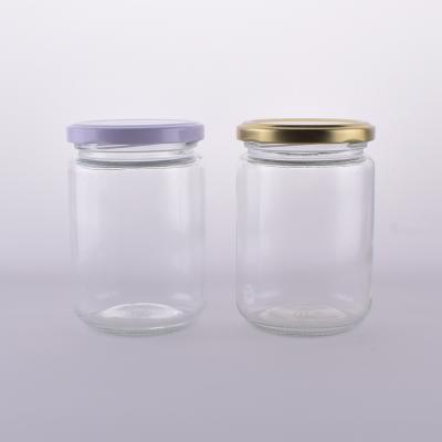 China New Round 250ml 350ml 500ml Cookie Jar 500g Home Storage Stackable Glass Jars With Metal Lid for sale