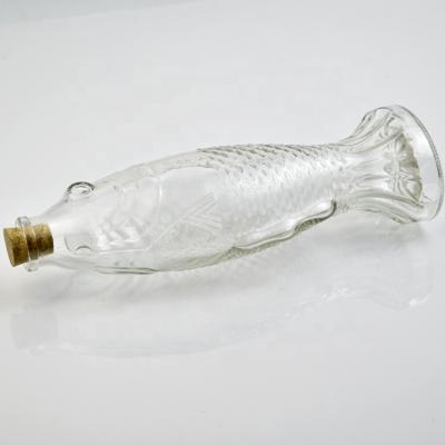 China Food Fish Shape Glass Flavoring Bottles For Fish Sauce Making Machine for sale