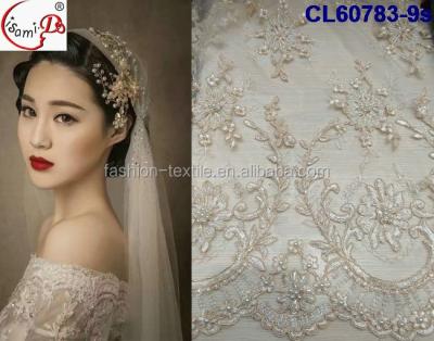 China 2020 Viable Luxury Wedding Lace Handmade Beaded French Lace Fabric 3D Lace Fabric For Bridal CL60783 for sale