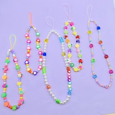 China Smiling Soft JUHU Pottery Cell Phone Chain Insti Letter Pottery Love Mobile Phone Bead Fashionable Acrylic Soft Handmade Wrist Lanyard for sale