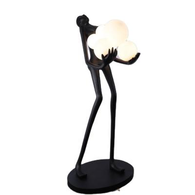 China Post-modern Nordic Home Decor Human Sculpture Lamps Sculpture Design Creative Resin Holding Decorative Light for sale