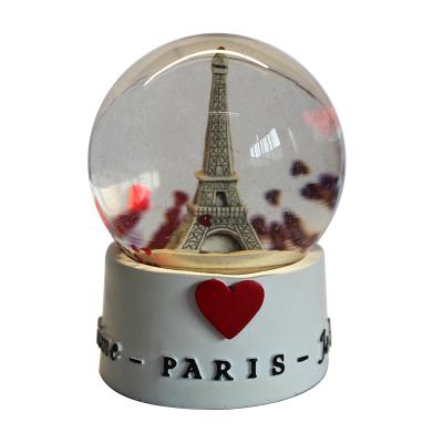 China Europe Eiffel Tower Snowball Manufacturers Custom Snow Globe for sale