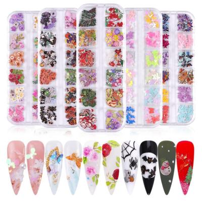 China Popular hot nail jewelry set of 12 nail jewelry grid wood paste butterfly multicolor style Christmas and Halloween color flowers for sale