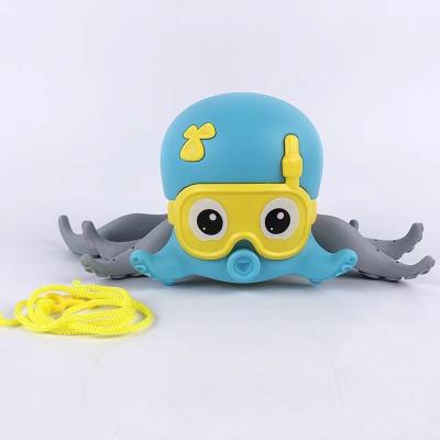 China Bath Toy New Creative Amphibious Octopus Splashing Toys Children Wind-Up Bathroom Toys for sale