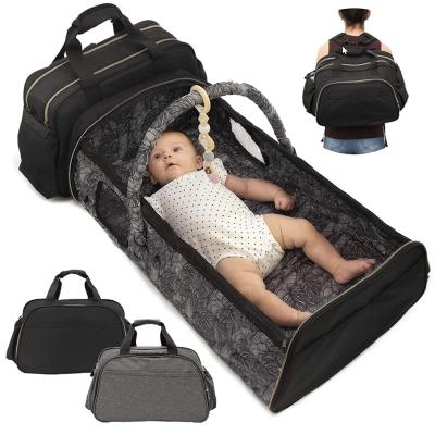 China Water Resistant 5 in 1 Mommy Nappy Diaper Bag with Bed Travel Backpack Foldable Crib for sale