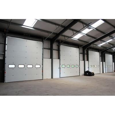 China Modern Automatic Sectional Industrial Garage Door With Pedestrian Gate for sale