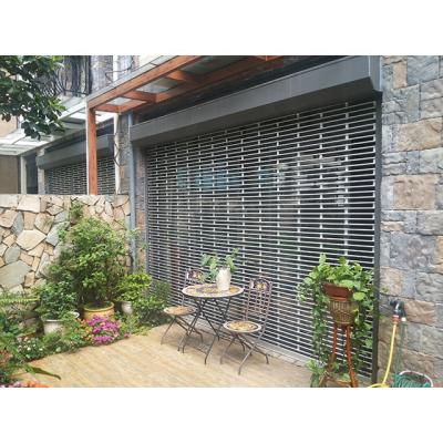 China Modern Single Layer Perforated Aluminum Alloy Roller Shutter Door With Grilles Design In Shenzhen Factory for sale