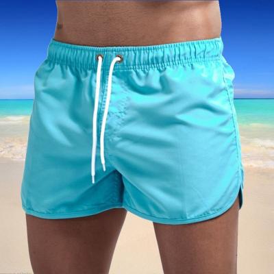 China New Wholesale Summer Anti-Wrinkle Casual Sports Men's Large Size Beach Solid Color Breathable Shorts for sale