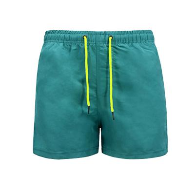 China New Trend QUICK DRY Summer Beach Casual Solid Color Drawstring Men Plus Size Beach Three-point Pants for sale