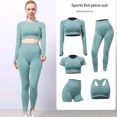 China 2022 Spring And Autumn Solid Color Sports Bra Pants Popular Seamless Knitted Long Sleeve Fitness Yoga Clothes Breathable 5 Piece Set for sale