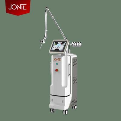 China Partial Acne Treatment Vaginal Tightening Machine Fractional Co 2 Laser Machine CO2 Laser For Scar Removal Machine for sale