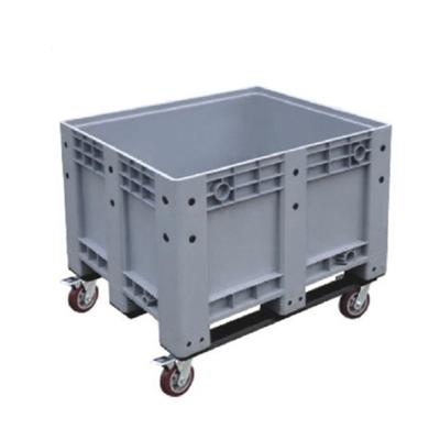 China Storage Fruits 600 Liter Heavy Duty Stackable Liquid Plastic Pallet Box Container With Movable Wheels for sale