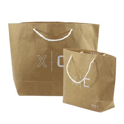 China Handmade Wholesale Luxury Custom White Brown Kraft Paper Shopping Paper Bag White Shopping Bags With Logos for sale