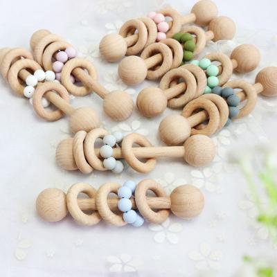 China Hot Sale Eco-friendly Material Gym Ring Rodent Silicone Beads Newborn Montessori Ratchets Wooden Toys Baby Teether for sale