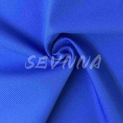 China Recycled Polyester Double Warp gebreide stof voor duurzame kleding Te koop