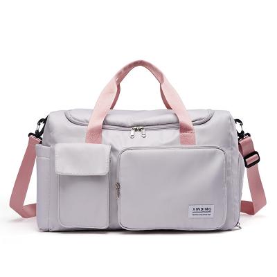 China Multifunctional Women OEM Customize Hand Tote Bag Large Capacity Travel Sling Shoulder Bag With Independent Shoe Compartment Pink Gray for sale