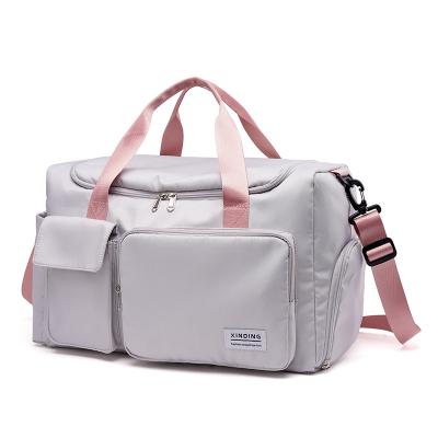 China Multifunctional Customize Sport Gym Handbag Tote Bag Large Capacity Sling Shoulder Travel Bag With Independent Shoe Compartment Pink Gray for sale