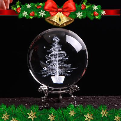 China Europe Christmas Tree Crystal Ball Ornaments Laser Snow Crystal Ball With Wood Led Light Base for sale